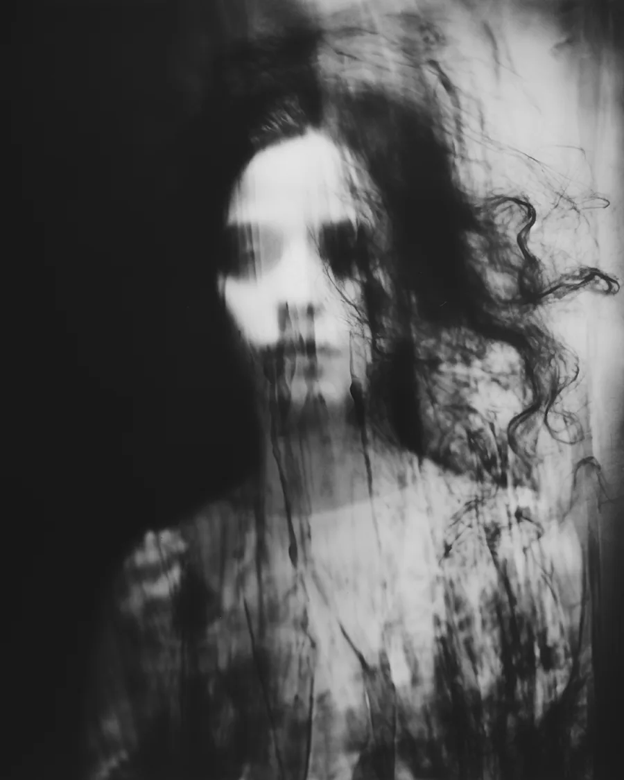 Black and white image: A Glance Into Darkness.