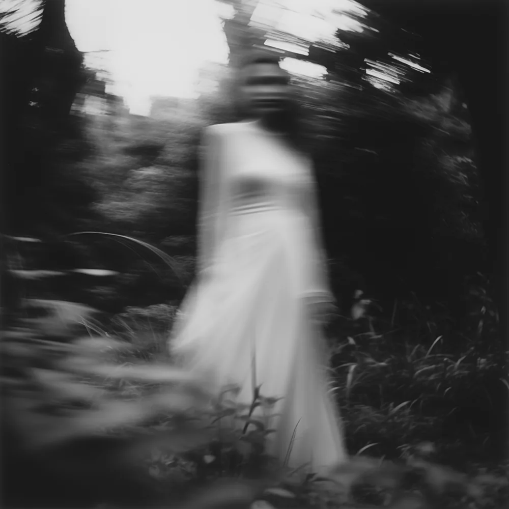 Black and white image: Her Sacred Grounds Kept.