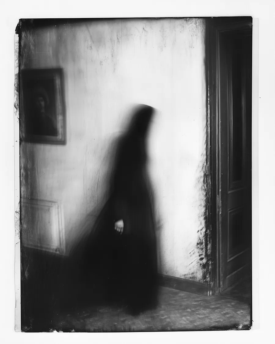 Black and white image: Lingering Beyond The Frame.