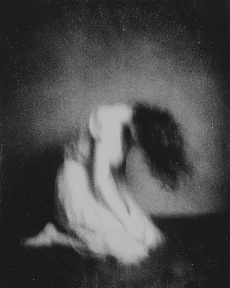 Black and white image: She Knelt.